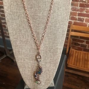 Necklace with heart pendant and jewels